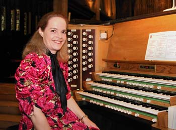 Photograph of Margaret Phillips at an organ console